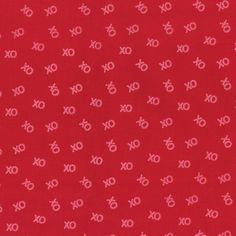 red fabric with white xo symbols on it