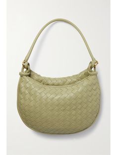 Green Gemelli medium intrecciato leather shoulder bag | BOTTEGA VENETA | NET-A-PORTER Elegant Intrecciato Hobo Bag For Travel, Elegant Shoulder Bag With Woven Leather And Round Handle, Elegant Bags With Woven Leather And Round Handle, Elegant Bag With Woven Leather And Round Handle, Chic Green Shoulder Bag With Intrecciato Weave, Luxury Olive Leather Shoulder Bag, Modern Green Bag With Intrecciato Weave, Luxury Green Textured Leather Shoulder Bag, Bottega Veneta Bag Green