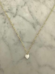 -gold plated chain -shell heart Heart Shaped Gold Chain Necklace For Gift, Gold Chain Necklace With Heart Pendant And Beads, Dainty Heart-shaped Gold Chain Jewelry, Yellow Gold Heart Necklace With Gold Chain, Elegant Heart Shaped Gold Chain Necklace, Gold Dainty Heart Necklace With Pearl Charm, Gold Plated Heart Charm Necklaces, Heart Shaped Gold Chain Necklaces As Gifts, Gold Heart Pendant Chain Necklace With Heart Beads