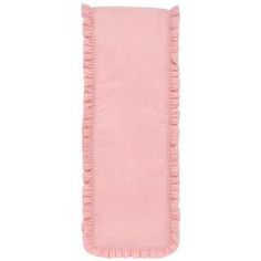 a pink blanket with ruffles on the bottom and one side, in front of a