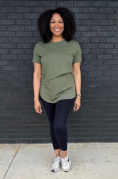 Nursing T-shirt With Asymmetrical Flap - Olive Green Versatile Green Short Sleeve Top, Summer Athleisure Tops For Layering, Green Short Sleeve T-shirt For Layering, Stretchy Bump-friendly Everyday Tops, Summer Fitted Bump Friendly Tops, Casual Stretch Top With Asymmetrical Hem, Versatile Green Tops For Workout, Green Athleisure Top For Layering, Nursing Friendly Stretch Tops For Everyday