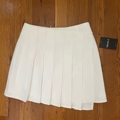 Brand New Never Worn Asymmetrical Pleated Tennis Skirt. Very Cute And Trendy For The Spring /Summer Months! Asymmetrical Skort, Tropical Skirt, Silk Wrap Skirt, Rayon Skirt, Ralph Lauren Skirts, Pleated Tennis Skirt, Free People Skirt, Wrap Maxi Skirt, Tie Dye Maxi