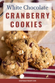 white chocolate cranberry cookies are stacked on top of each other with the words, white chocolate cranberry cookies