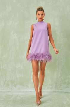 Beautiful sleeveless chiffon, mock neck mini dress with ostrich feather trim. This adorable dress can easily be dressed up or down with a change of shoe.  Made to order in Italy. Please allow 4-5 days for production and 5-7 for shipping. Feather Mini Dress, Ostrich Feather Trim, Feather Trim, Ostrich Feather, Lilac Dress, M 4, Sleeveless Mini Dress, Cami Dress, Invisible Zipper