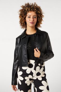 Faux leather cropped jacket- layer up with this retro inspired jacket - cropped length that is perfect with dress or high waisted style - button down front - pointed collar - relaxed boxy fit - made of cotton polyurethane blend - available in chocolate & black Product Code: PGFV402 Trendy Single Breasted Faux Leather Jacket, Chic Faux Leather Outerwear With Snap Buttons, Fitted Leather Cropped Jacket For Spring, Trendy Leather Jacket With Button Closure, Spring Faux Leather Single Breasted Jacket, Spring Faux Leather Single-breasted Jacket, Spring Collared Faux Leather Outerwear, Spring Single Breasted Faux Leather Jacket, Trendy Faux Leather Outerwear With Snap Buttons