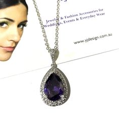 "A something blue navy sapphire cz drop bridal necklace with teardrop pendant made of cubic zirconia teardrop and brilliant cz hanging onto white gold silver rhodium bail and chain. You may also choose violet purple, emerald green or topaz brown pear drop to match your outfit or as a gift. Pendant is 1 1/4\" (3.1cm). Chain length can be added with a 2\" extender chain. View matching, similar design and other color options at https://etsy.me/2XN9lO3 View all something blue designs at https://etsy Formal Teardrop Pendant Jewelry Sets With Cubic Zirconia, Formal Cubic Zirconia Jewelry Set With Teardrop Pendant, Cubic Zirconia Pendant Jewelry Sets For Wedding, Anniversary Jewelry Set With Cubic Zirconia Pendant, Anniversary Cubic Zirconia Pendant Jewelry Set, Anniversary Cubic Zirconia Jewelry Sets With Pendant, Cubic Zirconia Pendant Earrings For Wedding, Diamond Pendant Jewelry Set For Wedding, Wedding Diamond Pendant Jewelry Sets