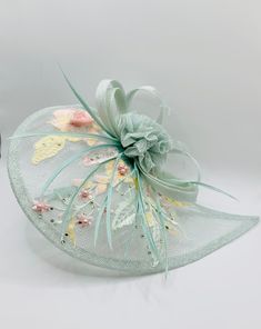 Stunning Mint Green Plink Wedding Fascinator Hat Duck Egg Blue Accents  Size 30.5 x 23cm head band or hair clip attachment  Perfect mother-of-the-bride wedding day accessory.   Elegant addition for those on the day essentials. matching Clutch Bag and Shoes available Green Wedding Headband Hair Accessory, Green Headband For Wedding, Green Wedding Headband For Royal Ascot, Green Headband For Royal Ascot Wedding, Green Headband For Wedding At Royal Ascot, Spring Wedding Headband With Pinched Crown, Elegant Spring Ceremony Hair Accessories, Green Wedding Headband, Elegant Hair Accessories For Spring Ceremonies