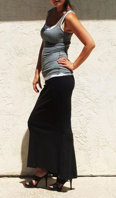 "Mermaid long skirt in figure flattering silhouette This maxi skirt is designed to fit from waist to knees and flares to hem We have only a few left -Made of high quality stretch interlock knit jersey -Fitted fit through knees and A-line silhouette to ankle -Slight high low hem -Elastic waist for easy pull on -Waist sits below naval Is your measurements off sizes? Please ask us about custom skirt. There will be additional charge for custom order. Please inquire via message *Model is 28\" waist, Fitted Black Casual Maxi Skirt, Fitted Black Maxi Skirt Casual, Black Fitted Casual Maxi Skirt, Black Fitted Maxi Skirt Casual, Fitted Full-length Maxi Skirt, Fitted Full Length Maxi Skirt, Fitted Full-length Solid Maxi Skirt, Black Fitted Full Length Maxi Skirt, Full Length Stretch Black Skirt