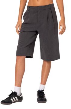 Blend both the professional and playful into your casual look with these trouser-inspired Bermuda shorts enhanced by clean lines and front pleats. Zip fly with hook-and-bar closure On-seam pockets; back welt pockets 100% polyester Machine wash, dry flat Imported Wide Leg Pleated Shorts For Workwear, Pleated Wide Leg Shorts For Work, Pleated Knee-length Bottoms For Work, Knee-length Pleated Bottoms For Work, Pleated Knee-length Shorts For Work, Solid Bermuda Shorts For Work, Workwear Shorts With Welt Pockets, Gray Workwear Shorts, Solid Color Workwear Shorts With Welt Pockets