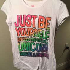 New White T-Shirt By Justice For Big Girls. “ Just Be Yourself Unless You Can Be A Unicorn. Then Be A Unicorn.” Size 14. (626) Fun Unicorn Print T-shirt For Summer, Playful Cotton T-shirt With Unicorn Print, Fun Summer T-shirt With Unicorn Print, White Unicorn Print T-shirt For Summer, Cute Rainbow Print Short Sleeve T-shirt, Casual Multicolor Unicorn Print T-shirt, Summer White T-shirt With Unicorn Print, Playful White Top With Rainbow Print, Fun Unicorn Print Short Sleeve T-shirt