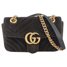 Gucci Marmont Mini Black Velvet Camera Bag These are professional photos of the actual bag offered by Luxbags. The Gucci Marmont Bag is a timeless and adaptable accessory designed by the renowned brand Gucci. Its signature V-shaped chevron stitching and prominent GG logo hardware on the flap opening make it instantly recognizable. The gold-tone chain and leather strap add a touch of luxury and convenience. From day to night, this handbag will serve as a staple in your wardrobe. CONDITION: VERY G Gucci Formal Pouch Shoulder Bag, Gucci Formal Shoulder Bag With Dust Bag, Formal Gucci Pouch Shoulder Bag, Gucci Rectangular Shoulder Bag With Gold-tone Hardware, Designer Gucci Pouch Bag, Gucci Rectangular Bag With Gold-tone Hardware, Gucci Bags With Gold-tone Hardware For Formal Occasions, Formal Gucci Bag With Gold-tone Hardware, Gucci Formal Crossbody Bag