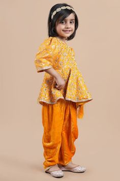 Orange floral embroidered peplum top with tassel details. Paired with a dhoti pant. - Aza Fashions Floral Peplum Top, Dhoti Pants, Floral Peplum, Fashion App, Pant Set, Aza Fashion, Peplum Top, Puff Sleeve, Pants Set