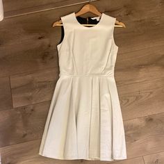 This Dress Is Absolutely Incredible! Retailed For Over $1200! It Has Never Been Worn And It’s In Perfect Condition. The Leather Pleats And Exposed Zipper On The Back Are Absolutely Show-Stopping!! White Lined Mini Dress For Formal Occasions, Formal White Lined Mini Dress, White Pleated Mini Dress For Work, White Fit And Flare Mini Dress For Formal Occasions, White Fit And Flare Formal Mini Dress, Formal White Fit And Flare Mini Dress, Classic White Mini Dress For Workwear, Classic White Mini Dress For Office, White Pleated Office Dress