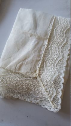 Dainty vintage lace handkerchief with the prettiest of lace trim. Would be a beautiful gift for the bride to be! Elegant White Handkerchiefs With Crochet Lace, Classic Handkerchiefs With Lace Trim As Gift, Elegant Lace Work Handkerchiefs Gift, Lace Handkerchiefs With Lace Trim For Wedding, Elegant Lace Handkerchiefs With Lace Trim, Lace Wedding Handkerchiefs With Lace Trim, Lace Wedding Handkerchiefs With Lace Work, Elegant White Lace Handkerchiefs, Wedding Lace Handkerchief With Lace Work