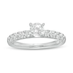 With eye-catching sparkle, this diamond engagement ring is anything but ordinary. Crafted in cool 10K white gold, this timeless choice features a 1/2 ct. diamond atop a bold diamond-lined shank. The inside of the shank is rounded for all-day comfort. Captivating with 1 ct. t.w. of diamonds and a brilliant buffed luster, this engagement ring simply dazzles. Resize Ring, Diamond Stone, Stone Settings, Diamond Engagement Ring, Ring Designs, Diamond Engagement, Fashion Rings, Diamond Engagement Rings, Band Rings