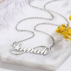 Production Day: 5-7 Days Package: 1 Pack Custom Name Necklace Material: Made of high-quality stainless steel or 925 Silver,100% safe to sensitive skin Color: Gold/Silver/Rose Gold Chain Length: 40+5cm/45+5cm(default)/50+5cm Sweet Gift: Come with a delicate jewelry box,Box packing Dainty Suitable for all occasions: Can be used for various purposes, as a Birth commemoration, Graduation, anniversary of marriage,men's promise,wedding necklace, engagement necklace, anniversary and Valentine's Day gif Silver Stainless Steel Name Necklace, Silver Pendant Name Necklace, Custom Name Silver Necklaces, Silver Clavicle Chain Nameplate Necklace, Silver Clavicle Chain Necklace With Nameplate, Silver Stainless Steel Necklace For Personalized Gift, Personalized Silver Stainless Steel Necklace, Personalized Silver Necklace, Silver Name Necklace With Clavicle Chain Pendant