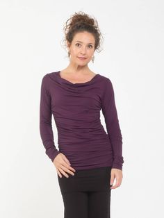 Ruched side panels create a flattering silhouette on one of our best selling long sleeve tops. It features a slightly draped neckline and hit just below the waist. [#details] Size Suggestions S: 2-4 M: 6-8 L: 10-12 [/details] [#fabric] Rayon Lycra: 90% Rayon (Viscose) / 10% Spandex (Lycra) [/fabric] Versatile Long Sleeve Ruched Top, Fitted Foldover Long Sleeve Top For Fall, Fitted Long Sleeve Foldover Top For Fall, Ruched Long Sleeve Top For Fall, Fitted Long Sleeve Top With Ruched Sides, Ruched Tops For Layering In Fall, Fall Ruched Tops For Layering, Fitted Tops With Ruched Sides For Fall, Long Sleeve Ruched Tops For Workwear