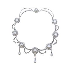 Vintage Inspired Queen  Margrethe II moissanite pearl necklace  for women Handmade Metal: Sterling Silver  Metal Purity:925 Metal weight: 75.99 gram Stone:  moissanite stone Ctw:25.90ctw Gemstone: Pearl Gemstone weight: 12.989 ct Item length:.17 inch > All products are made at our factory. So, you get the finest jewelry at factory prices without any extra cost of middlemen. > Pure 925 sterling silver jewelry. no alloy nothing. > All our products are made to order so you get a brand-new piece straight out of the factory. > All the craftsmen working at our factory are well experienced and strained to give you unmatched. > We do not use any type of chemical in our plating process to enhance the shine and luster of the metal which are harmful to your skin. we use AAA-quality stones which give Silver Pearl Jewelry With Diamond Accents, Luxury Silver Pearl Embellished Necklace, Silver Bridal Necklace With Pearl Chain And Crystal, Silver Crystal Pearl Necklace In Classic Style, Silver Pearl Necklace With Cubic Zirconia, Formal Silver Bridal Necklace With Pearls, Formal Silver Pearl Bridal Necklace, Luxury Silver Bridal Necklace With Pearl Pendant, Silver Pearl Necklaces With 17 Jewels