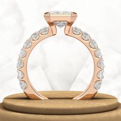 a rose gold engagement ring with diamonds on top