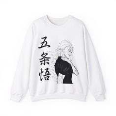 a white sweatshirt with an anime character on it