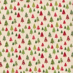 christmas trees on white fabric with red, green and yellow dots in the background is a ruler