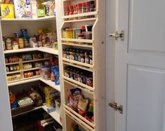 an open pantry with lots of food in it