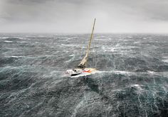 a sailboat in the middle of choppy water