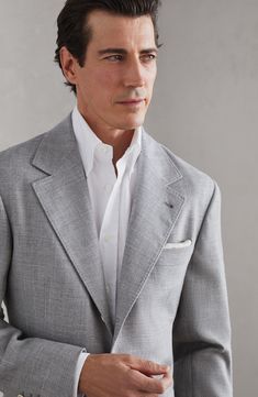 The combination of natural virgin wool, silk and linen fibers gives the chevron design a modern, relaxed look, with a slightly mottled and irregular effect characteristic of linen. A small presence of synthetic fiber contributes to the fabric’s structure, while the cupro lining provides added comfort. 3-roll-2 closure with horn buttons Notched lapel Welt pockets, ticket pocket and chest pocket Cuffs have four horn buttons and functional buttonholes Cupro half lining Two interior pockets with but Classic Linen Tweed Jacket With Notch Lapel, Elegant Unstructured Blazer For Semi-formal Occasions, Elegant Unstructured Semi-formal Blazer, Elegant Semi-formal Unstructured Blazer, Elegant Unstructured Single Breasted Sport Coat, Elegant Unstructured Single-breasted Sport Coat, Elegant Unstructured Sport Coat With Notch Lapel, White Classic Tweed Jacket For Formal Occasions, Classic White Tweed Jacket For Formal Occasions