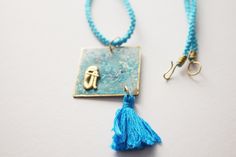 Ancient Greek Pendant Necklace, Square, Turquoise, Unique, Ethnic, Tribal, Long, Artistic, Abstract, Geometric, Greek Love, Necklace for Women Natural organic patina has covered the bronze piece of metal. Tassel is handmade by me as well as the cord which was made with kumihimo disc.  The jewelry comes in a gift box.  HANDMADE DISCLAIMER There might be slight alterations regarding the final outcome of each piece due to the nature of handmade craftsmanship. I will refund your purchase price (as l Greek Love, Kumihimo Disk, Gift Box Handmade, Bronze Necklace, Ancient Greek, Tassel Necklace, Necklace Etsy, Womens Necklaces, Jewelry Necklace Pendant