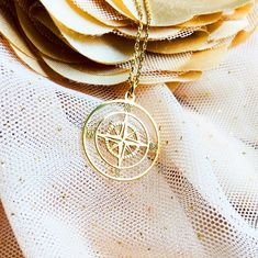 Our gold compass necklace is the perfect accessory for any adventurous spirit! With a beautiful compass pendant, it serves as a reminder to follow your own path and chase your dreams. Whether it's a graduation gift for women or a from-parents gift for a daughter, this necklace is a thoughtful and stylish choice. Make it even more special by adding a birthstone charm or initial disc. Order now and start your own journey with this stunning piece! ♡ DETAILS  Pendant  : 0.78"  x 0.78"(2 x 2 cm )  Ma Compass Design Pendant Necklace As Gift, Compass Design Pendant Charm Necklace As Gift, Gold Medallion Jewelry With Compass Design, Travel-themed Compass Design Round Pendant Necklace, Gold Compass Design Necklace For Travel, Gold Round Pendant Necklace For Travel, Gold Necklace With Round Pendant For Travel, Gold Compass Design Pendant Jewelry, Rose Gold Compass Design Necklace For Gift