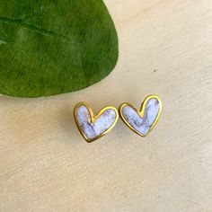 Tiny Gold Trim Heart Studs Perfect For Valentine’s Day! White Open Heart Earrings For Valentine's Day, Valentine's Day White Open Heart Earrings, White Heart Beads Earrings For Valentine's Day, White Heart Earrings With Beads For Valentine's Day, White Heart Earrings For Valentine's Day, Handmade White Heart Earrings For Anniversary, White Open Heart Earrings For Anniversary, Everyday White Heart Earrings, Cute White Heart Earrings For Valentine's Day