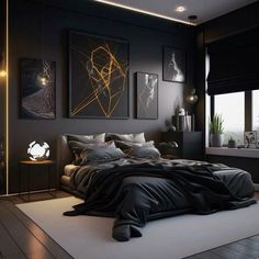 a black and white bedroom with artwork on the wall