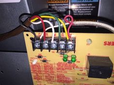 an electrical panel with some wires attached to it