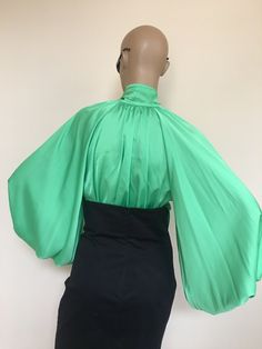 "This is a very stylish Womens Silk blouse. It is comfortable and cozy. Made for a free flowing fit. Great for all year around and for any special occasion or casual day can be dressed up or dressed down. SIZE CHART SIZE S - US 6, UK 8, EU 36 bust: bust around 34.5\"/90cm Waist: waist around 27.5\"/70cm Hips: hips around 34.5\"/90cm SIZE M - US 8, UK 10, EU 38 bust: bust around 37.5\"/95cm Waist: waist around 29.5\"/75cm Hips: hips around 37.5\"/95cm SIZE L - US 10, UK 12, EU 40 bust: bust aroun Chic Silk Blouse For Evening, Green Silk Top For Evening, Chic Long Sleeve Satin Top, Spring Silk Blouse For Cocktail, Satin Puff Sleeve Tops For Work, Silk Tops With Satin Finish For Evening, Evening Silk Tops With Satin Finish, Long Sleeve Blouse For Summer Cocktail Events, Spring Evening Blouse With Lantern Sleeves