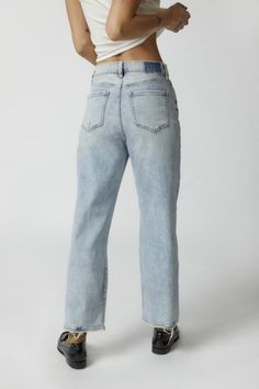 Get a classic lived-in look with these jeans from Daze Denim made using recycled materials. High-rise style with a relaxed fit from the waistband to the ankle-length hem. Finished with distressing throughout. Features Straight-leg Daze Denim jeans in a cropped silhouette Distressed Crafted from denim with a hint of stretch for comfort & fit Made with recycled materials Zip fly + 5-pocket styling Content + Care 60% Cotton, 33% recycled cotton, 5% polyester, 2% spandex Machine wash Imported Size + Medium Wash Distressed Rigid Denim Pants, Urban Washed Blue Rigid Denim Pants, Urban High-rise Rigid Denim Bottoms, Retro Pre-washed Rigid Denim Jeans, Non-stretch Medium Wash Denim Pants, High Rise Style, Ankle Length, Recycled Cotton, High Waist Jeans