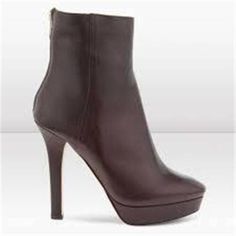 Sleek And Utterly Chic Design Of Rich Leather, Lifted With A Sturdy Platform And High Heel. Color: Brown. Self-Covered Heel, 5" (125mm) Covered Platform, 1" (25mm) Compares To A 4" Heel (100mm) Leather Upper Back Zip Leather Lining And Sole Padded Insole Made In Italy Size: 40 Eu (Insole Measures Approx. 10 1/8") Brand New In The Original Box. Chic Ankle-high Platform Boots With 4-inch Heel, Chic Platform Boots With Padded High Heel, Chic Business Boots With 4-inch Heel, Elegant Formal Platform Boots With 4-inch Heel, Chic High Heel Platform Boots With Reinforced Heel, Chic Platform Boots With Round Toe, Elegant Closed Toe Platform Boots For Fall, Elegant Platform Boots With Sculpted Heel And Almond Toe, Chic High Heel Platform Boots For Office