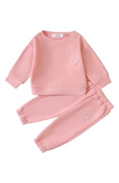 Little ones will play all day in the comfort of this logo-embroidered sweatshirt and sweatpants made from soft cotton. Includes sweatshirt and sweatpants Sweatpants have elastic waist 100% cotton Machine wash, dry flat Imported Black Owned/Founded Casual Cotton Sweats For Playwear, Winter Cotton Sweatpants For Playwear, Cotton Sweatpants For Winter Playwear, Letter Print Sweats For Spring Loungewear, Cotton Sets With Ribbed Cuffs For Spring, Winter Cotton Tracksuit For Loungewear, Cotton Winter Tracksuit For Loungewear, Cotton Athleisure Sweatshirt With Elastic Cuffs, Winter Matching Cotton Set