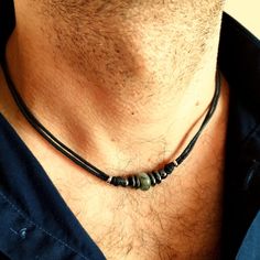 Surf style choker necklace for men with natural gray labradorite and black hematite stone beads on black cotton cord, stainless steel lobster clasp closure. A simple everyday necklace for men with natural stones will be a nice gift for him. Cotton cord choker necklace will be a great option for creating a casual look. labradorite stone bead aprox:  10-12 mm For all products are used only genuine high-quality Italian leather, natural stones and wood. All metal materials are lead and nickel free. Men Leather Necklace, Beaded Necklaces For Men, Black Minimalist Jewelry With Adjustable Cord, Adjustable Waxed Cord Choker Jewelry, Minimalist Adjustable Hand Wrapped Necklaces, Adjustable Spiritual Waxed Cord Jewelry, Minimalist Hematite Round Bead Jewelry, Minimalist Jewelry With Adjustable Waxed Cord, Hand Wrapped Black Jewelry With Waxed Cord