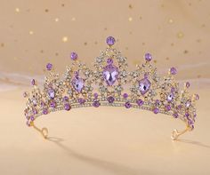 Material: Zinc Alloy, Rhinestone, Purple Crystal. Size: Approx 5.5" in diameter, 2.1" in height. Weight is 185g /0.4 lb. The size is suitable for most people's head. This romantic rhinestone tiara will look beautiful with any hair style. makes you standout in wedding, proms, parties or any other special soiree. Beautiful gold-plated rhinestone crown is encrusted with sparkling rhinestones and perfect for a wedding day princess. The perfect design makes this crown more elegant and suitable for the ladies and girls in any occasions, such as Wedding, Birthday, Engagements, Proms, Parties, Pageants, Valentine's Day, Anniversary or any occasion you want to be more charming. FAST and FREE SHIPPING Purple Quince, Quinceanera Crown, Crown Aesthetic, Purple Crown, 15 Birthday, Crystal Bridal Tiaras, Bridal Headwear, Beautiful Tiaras, Mens Fashion Jewelry