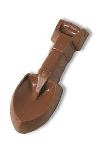 a shovel shaped chocolate candy mold on a white background, with the handle slightly extended