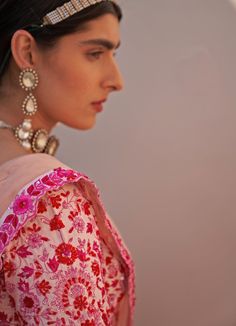 Features a blush pink raw silk lehenga set embroidered with traditional zardozi technique using resham work, dabka, cutdana and sequins and featuring a scallop border. Completed with two dupattas in pink and white hues with an embroidered resham border. Composition : Lehenga and Blouse - Raw Silk, Dupatta- Net Care: Dry Clean Only and Vacuum Storage This product can be customised for sleeves, length of blouse and neckline Delivery : 6-8 weeks as the product is hand crafted. Check Size Guide or c Pink Sharara For Navratri, Pink Chandbali Choli For Eid, Pink Sharara With Unstitched Blouse For Wedding, Wedding Pink Sharara With Unstitched Blouse, Pink Chanderi Wedding Sets, Pink Chanderi Set For Reception, Embroidered Pink Blouse Piece For Wedding, Pink Wedding Sets With Unstitched Blouse, Pink Wedding Set With Unstitched Blouse