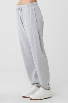 Cool down, warm up — the choice is yours with the Chill Sweatpant. Designed with ultra-soft, breathable French terry and a non-fuzzy, anti-cling interior, this lightweight bottom is made to hang or make moves. Classic cuffed bottoms, external drawcords and side-zippered pockets make this an everyday essential to wear on repeat. Soft, lightweight everyday sweatpant For working out and wearing out Designed & uniquely fit for every size Wear-tested by our in-house team for the perfect fit The Choice Is Yours, Woman Back, Back Women, On Repeat, Alo Yoga, Knit Set, French Terry, Everyday Essentials Products, Heather Grey