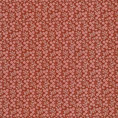 a red and white floral pattern on fabric