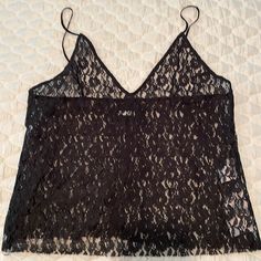 Beautiful Lace Top Never Worn, All Fabric Tags Still Attached. Made In Usa. Size Large Chic Black Lace Camisole Top, Black Lace V-neck Tank Top, Black Lace Top With Built-in Bra For Party, Black Lace Top With Spaghetti Straps For Party, Black Lace Sleeveless Camisole, Black Lace V-neck Camisole, Chic Cami Lace Top For Night Out, Chic Lace Cami Top For Night Out, Black Lace Camisole Top For Spring