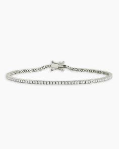 Achieve a truly timeless look with the Melbourne Diamond Tennis Bracelet. This gorgeous solid white gold tennis bracelet features a timeless, diamond encrusted design that is perfect for any occasion. To wear, stack alongside other white gold or diamond bracelets. More is more! Melbourne Diamond Tennis Bracelet in 14k Solid White Gold/6.5, Women's Size 6.5 in. by gorjana Luxury Diamond Tennis Bracelet With Pave Setting, Timeless White Diamond Bracelet In Platinum, Timeless White Diamond Platinum Bracelet, White Platinum Diamond Jubilee Bracelet, Elegant White Tennis Bracelet With Diamond Accents, White Platinum Jubilee Diamond Bracelet, White Gold Tennis Bracelet With Diamond Accents, Classic White Gold Diamond Bracelet With Pave Setting, White Diamond Tennis Bracelet With Pave Setting