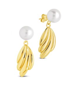 Indulge in luxury with our Chérie Drop Studs. These elegant earrings feature lustrous pearls, hand-selected for their exquisite beauty. The delicate drop design adds a touch of sophistication to any outfit, making these studs the perfect statement piece for any occasion. Material: 14K gold or rhodium plated brass, shell pearls Features: 1.25" drop, 0.3" stud, 0.95" charm, 9mm pearls, Lead & Nickel free, post back Chic Dangle Pearl Earrings For Formal Occasions, Chic Formal Dangle Pearl Earrings, Elegant Pearl White Earrings With Pearl Chain, Elegant Round Teardrop Earrings With Pearl Drop, Refined Gold Pearl Drop Earrings, Elegant Drop Pearl Earrings For Party, Elegant Pearl White Pearl Chain Earrings, Elegant Pearl Pendant Earrings For Party, White Elegant Teardrop Earrings