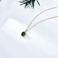 Our exquisite 18K Gold Pendant Necklace, adorned with a stunning ovalshaped emerald, is designed to bring timeless elegance and sophistication to any womans jewelry collection. Expertly crafted from premium 18K gold, this pendant necklace features a captivating ovalshaped emerald that radiates luxury and charm. The rich green hue of the emerald contrasts beautifully with the lustrous gold setting, creating a piece that is as durable as it is stunning. Perfect for special occasions or everyday wear, this necklace will be a cherished addition to any wardrobe. Emerald And Diamond Necklace, Statement Engagement Ring, Photo Locket Necklace, Sterling Silver Anklet, Engagement Ring Shapes, Clover Earrings, Gold Charm Necklace, Kids Necklace, Jewelry Luxury