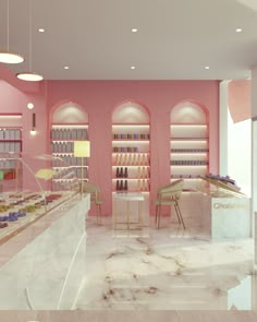 the interior of a nail salon with pink walls and marble floors