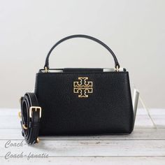 Nwt Tory Burch Britten Micro Satchel Leather Crossbody In Black Details: Black Pebbled Leather Magnetic Snap Closure Adjustable Detachable Crossbody Strap Approx. Measurements: 5" X 8" X 3" In Smoke Free Home!! All Items Are Guaranteed 100% Authentic And Brand New ! Tori Burch Handbags Black, Tory Burch Britten, Tory Burch Crossbody Bag, Tory Burch Purse, Tory Burch Crossbody, Tory Burch Wallet, Small Leather Bag, Convertible Crossbody Bag, Tory Burch Handbags