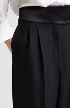 A cummerbund-inspired satin waistband hits a fun and formal note for pleated pants cut from pure wool. 30 1/2" inseam; 20" leg opening; 14" front rise; 16 1/2" back rise (size 42IT) Zip fly with hook-and-bar closure Front slant pockets; back welt pockets 100% wool with 100% polyester contrast Dry clean Imported Designer Clothing Sleek Wide Leg Pants With Belt Loops For Evening, Sleek Wide Leg Pants For Evening With Belt Loops, Formal Silk Straight Leg Wide Pants, Formal Silk Wide Leg Pants With Pressed Crease, Silk Tapered Leg Bottoms For Evening, Classic Wide-leg Pants With Pleated Waist, Silk Wide-leg Bottoms With Pressed Crease, Silk Wide Leg Bottoms With Pressed Crease, Elegant Silk Straight Pants